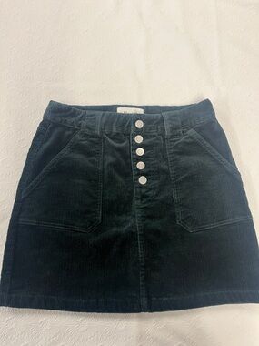 High-Rise Corduroy Button-Front Mini Skirt in Dark Green.